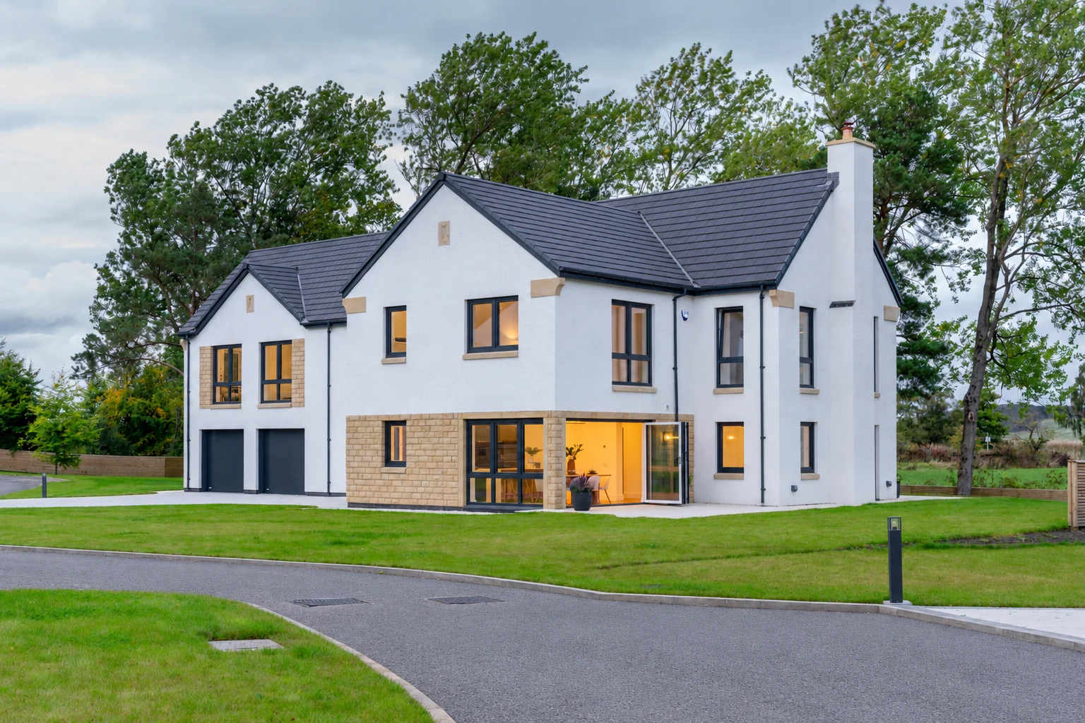House Type 1, Byrehope, framed by mature trees