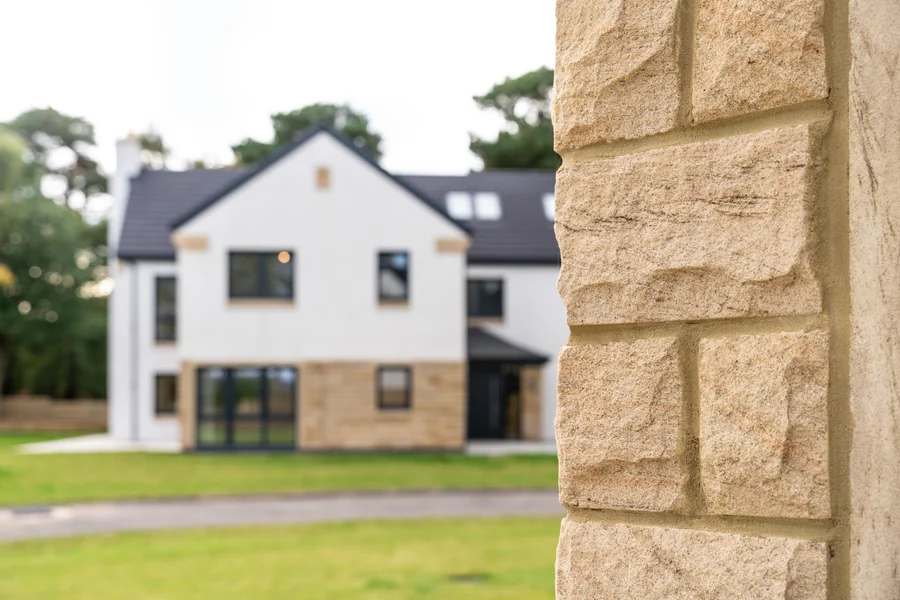 The texture of the homes’ natural sandstone